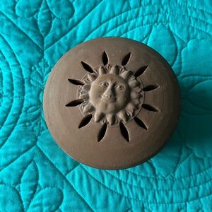 Brown Sun Face Clay container with top